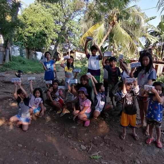 Davao Philippines children receive milk